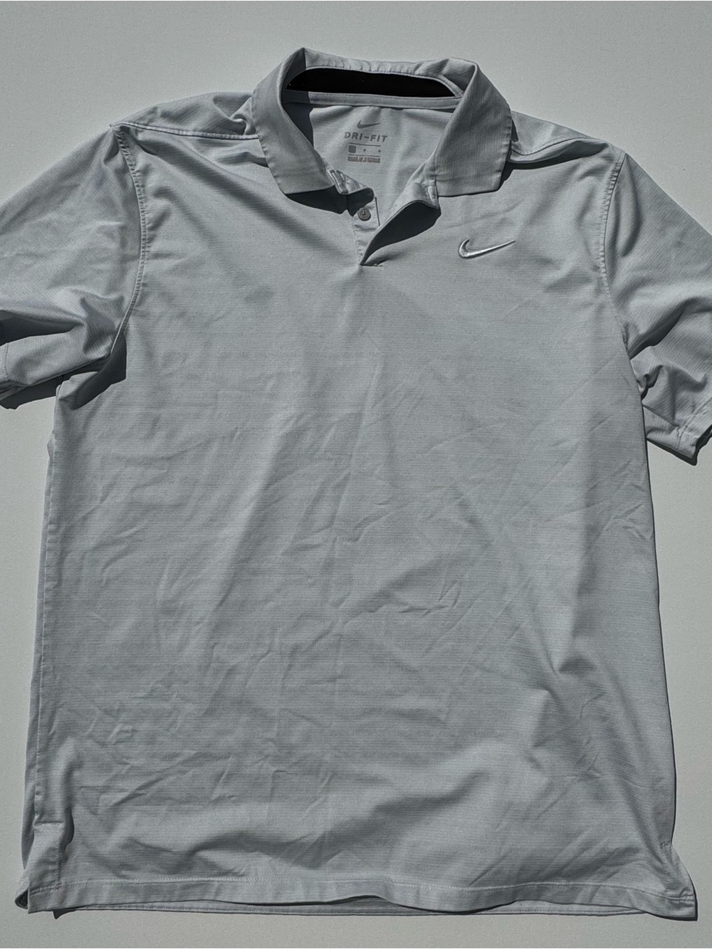 Nike Golf Men's Light Gray Polo Shirt with Subtle Swoosh